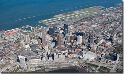 The Downtown Cleveland Ohio skyline including Progressive Field, Quicken Loans Arena, the Terminal Tower, Cleveland Stadium, and Burke Lakefront Airport