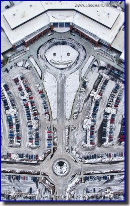 Aerial photo - abstract view of driveway and decorations resembling a baby