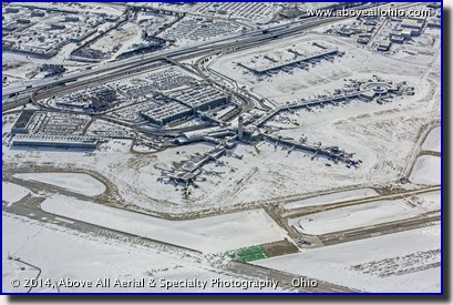 A snowy winter aerial view of the passenger terminal at Cleveland Hopkins International Airport (KCLE), Cleveland, Ohio.