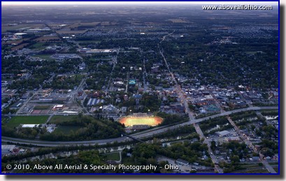 Aerial photograph of Selby Field and the campus of Ohio Wesleyan University at dusk, Delaware, OH