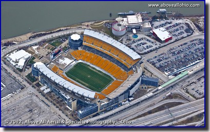 An oblique aerial view of a cold, deserted Heinz Field Stadium in downtown Pittsburgh, Pennsylvania.