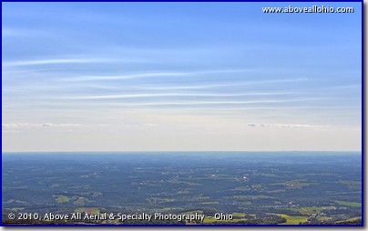 High thin clouds somewhere over Ohio are rippled by upper level winds