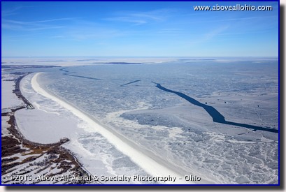 A winter aerial photograph of a nearly frozen Lake Erie near Sandusky and Cedar Point, OH.