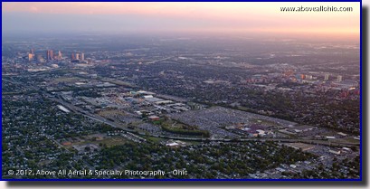A wide angle aerial panorama of the Ohio State Fair (just left of center in this photo) at sunset. Downtown Columbus, The Ohio State Univerty, and the Columbus Crew stadium are all visible.